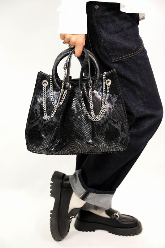Sac à main noir motif serpent