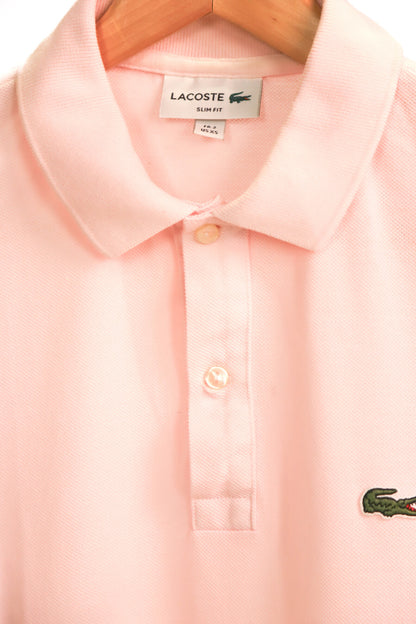 Polo rose Lacoste Taille M