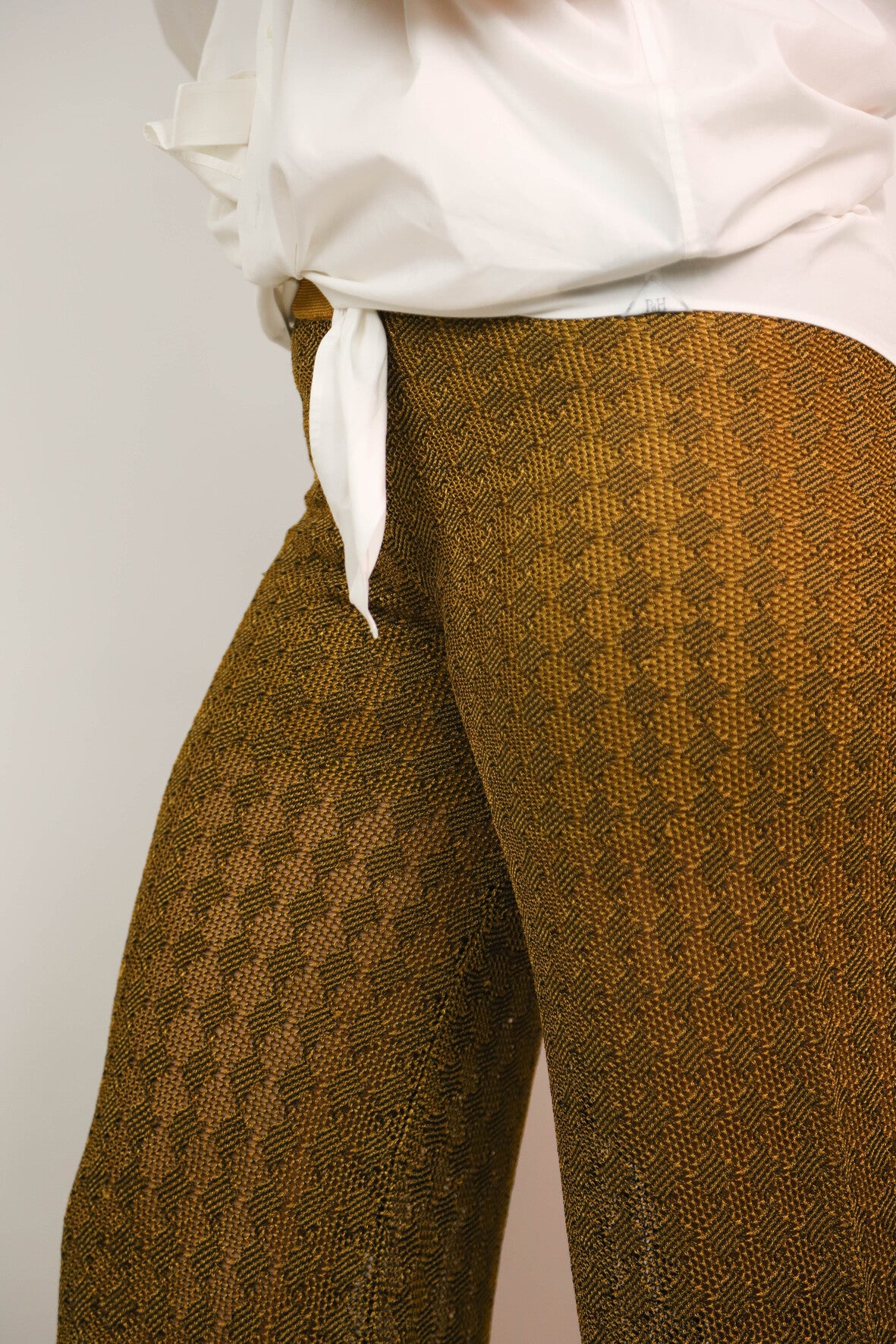 Pantalon doré et noir Taille M