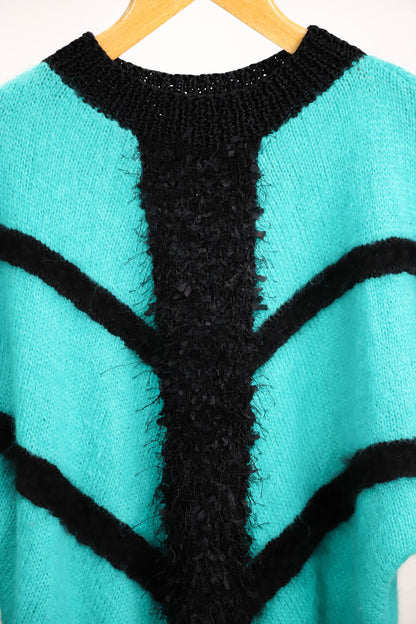 Pull vert et noir taille M