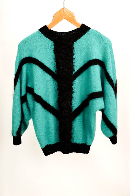 Pull vert et noir taille M