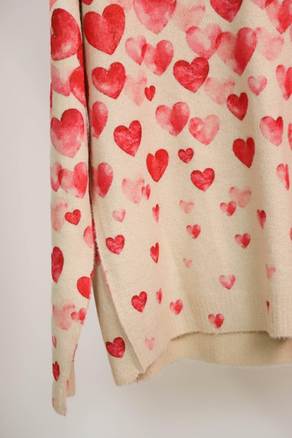 Pull beige coeurs roses Taille XL