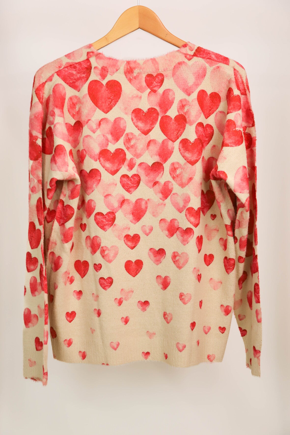 Pull beige coeurs roses Taille XL